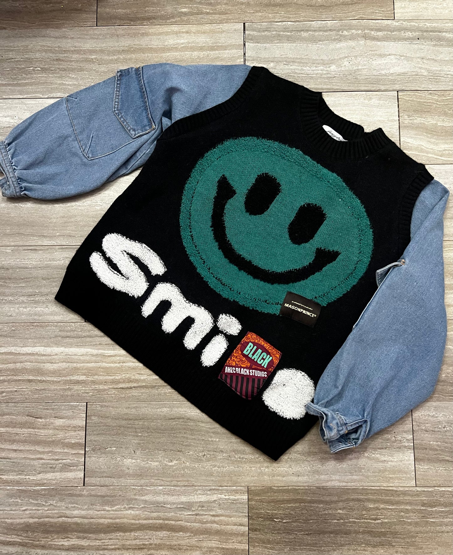 Smile mixed print denim patch sweater